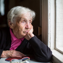 Social Isolation - Woman by a window